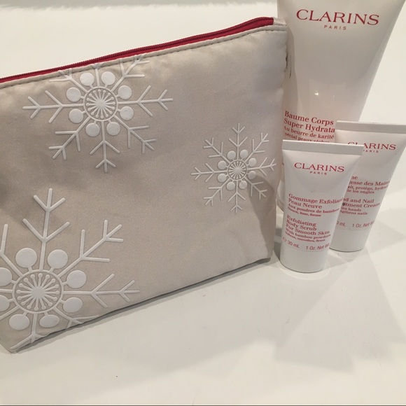 Clarins Paris | Lotions & Makeup Bag Set - Picture 11 of 12